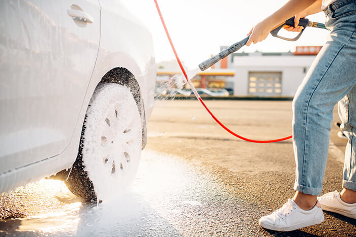 car washing with pressure washer