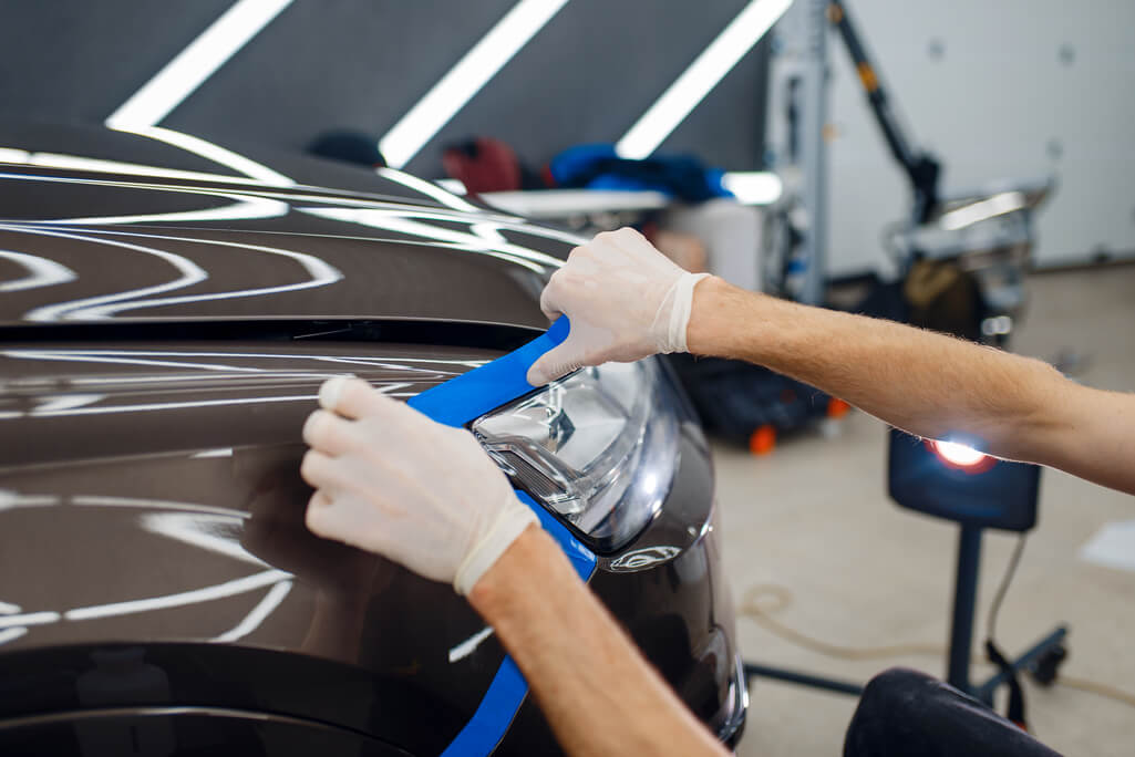 person preparing vehicle for car touch up paint